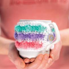 Popcorn stitch crochet mug cosy