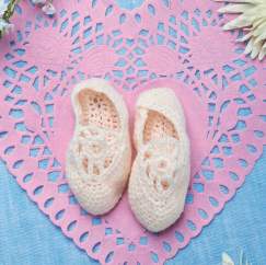 Dainty crochet baby slippers