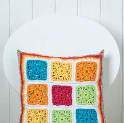 Colourful granny square crochet cushion
