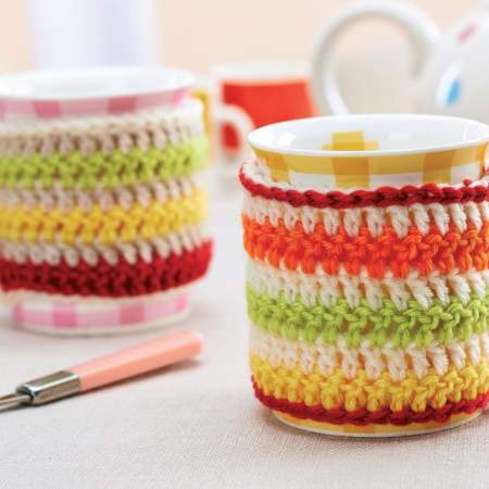 Striped crochet mug cosies