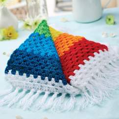 Stripy crochet rainbow blanket